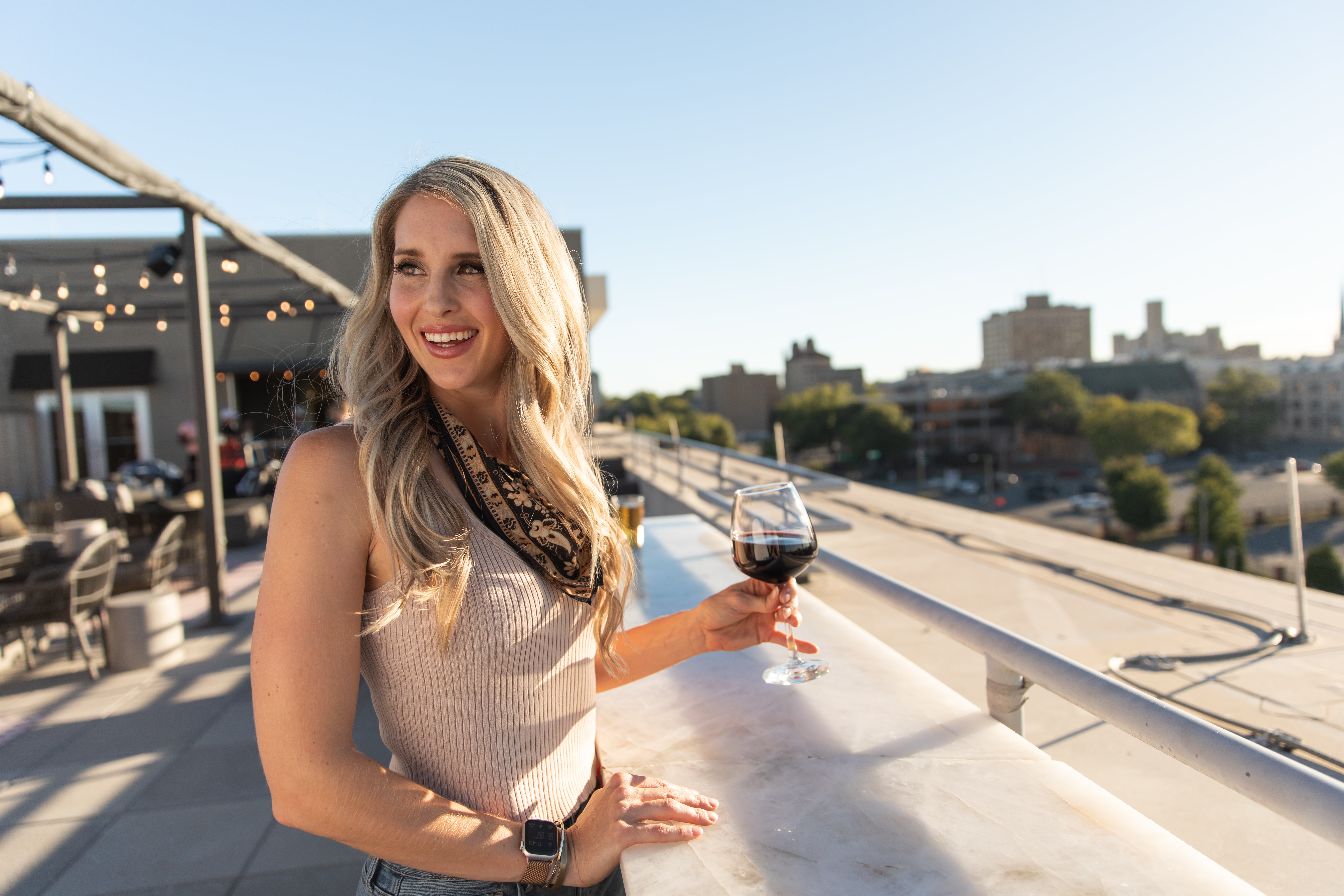 Woman drinking wine at Hilton Garden Inn
