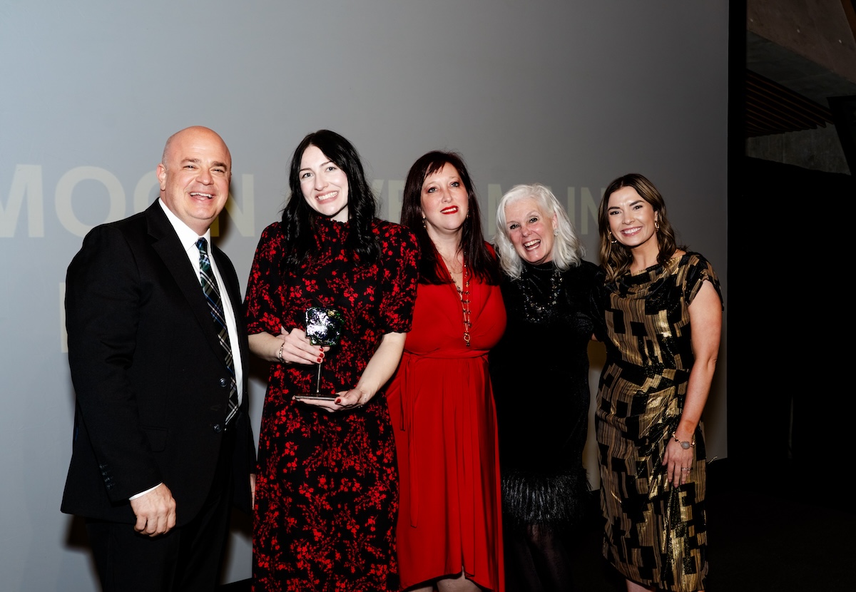 Sec. Shea Lewis, Arkansas Department of Parks, Heritage and Tourism; Moon Over Main - Russellville members, The Natural State Tourism Development Award; Dalaney Thomas, Arkansas Tourism Director