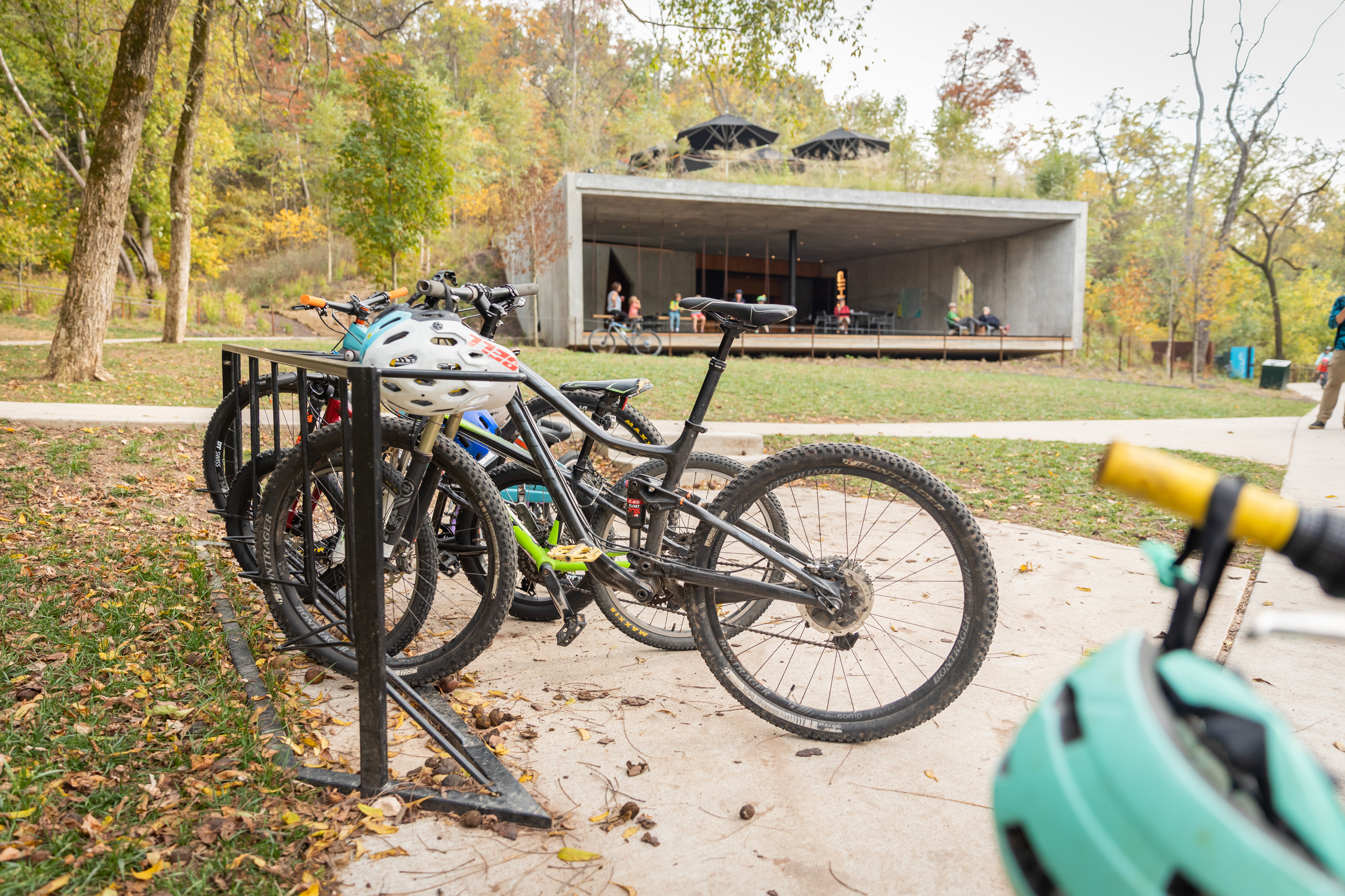 People gathered at coffee shop taking a break from mountain biking