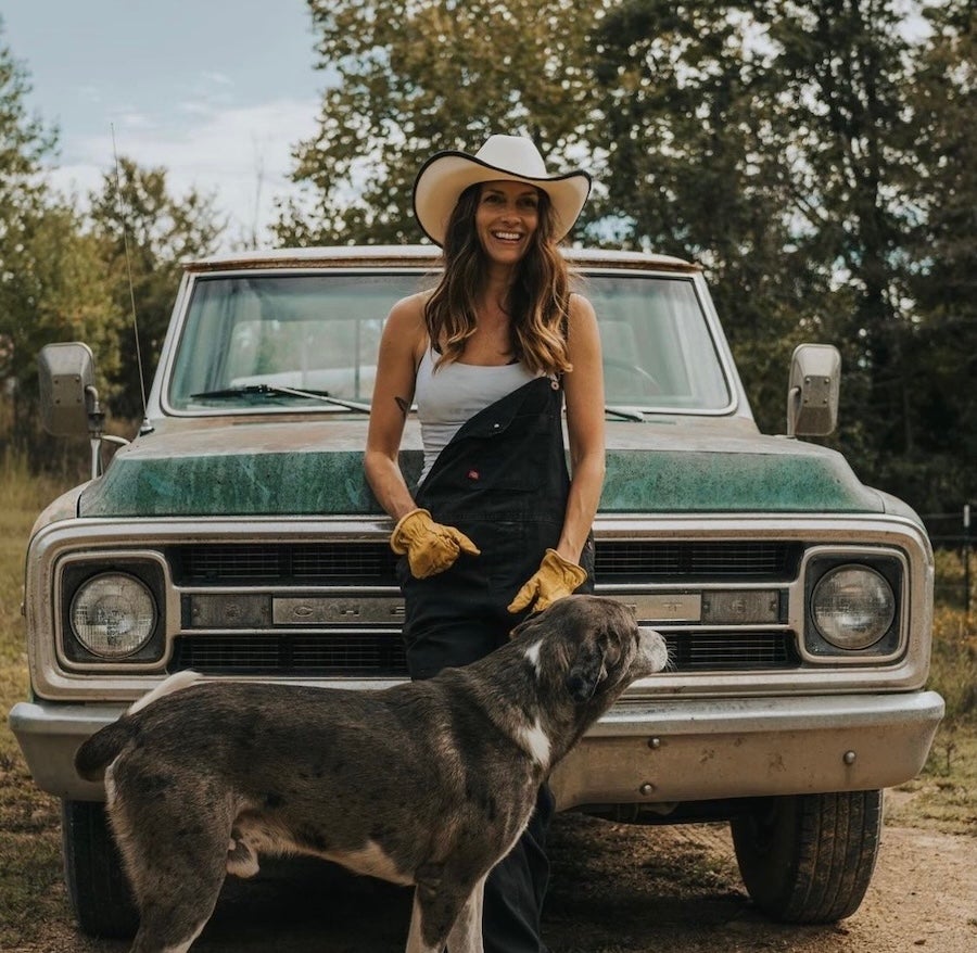 photo of Dawn with a truck and dog