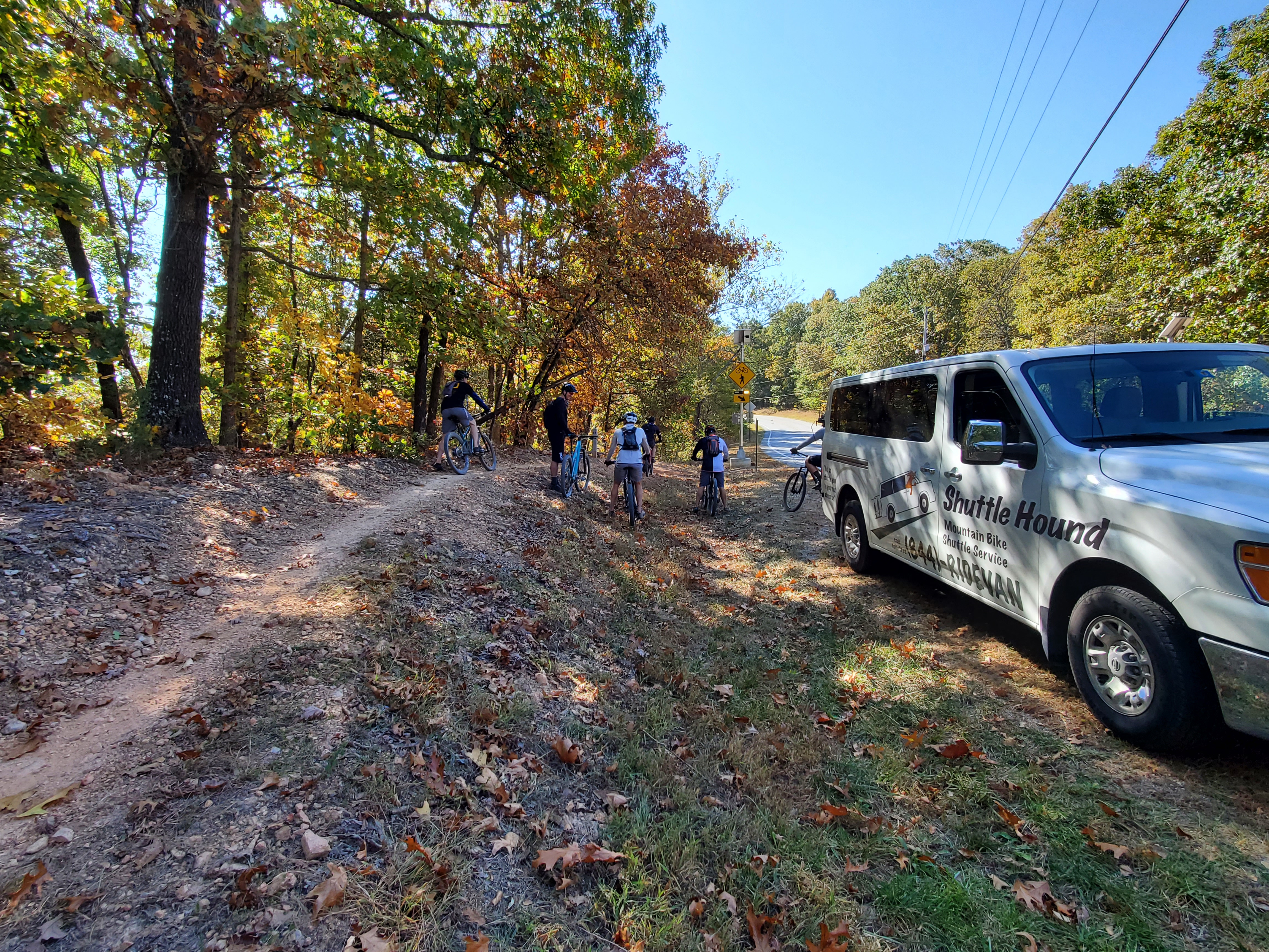 Riders getting dropped at a trail by Shuttle Hound mountain bike shuttle service in Northwest Arkansas.