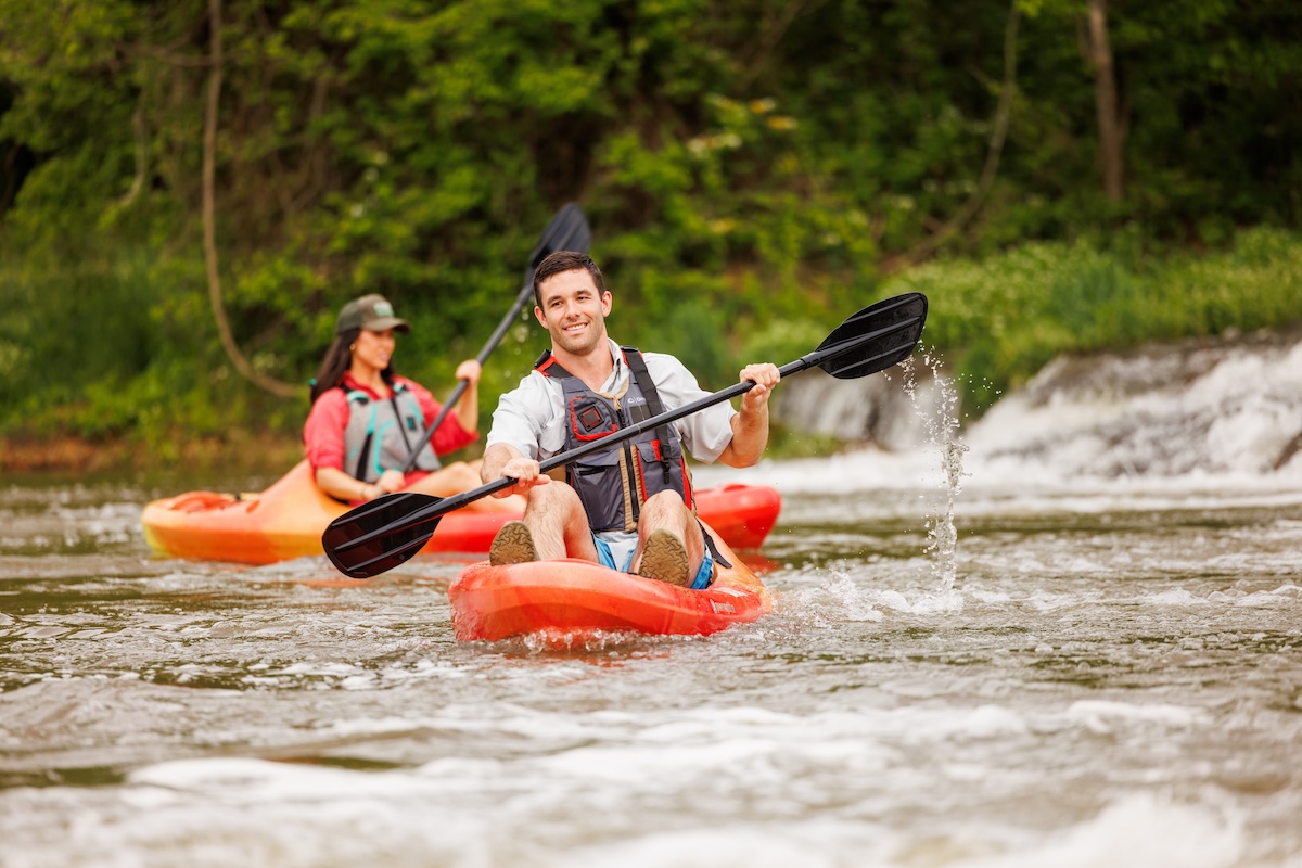 Couple of friends floating the Spring River