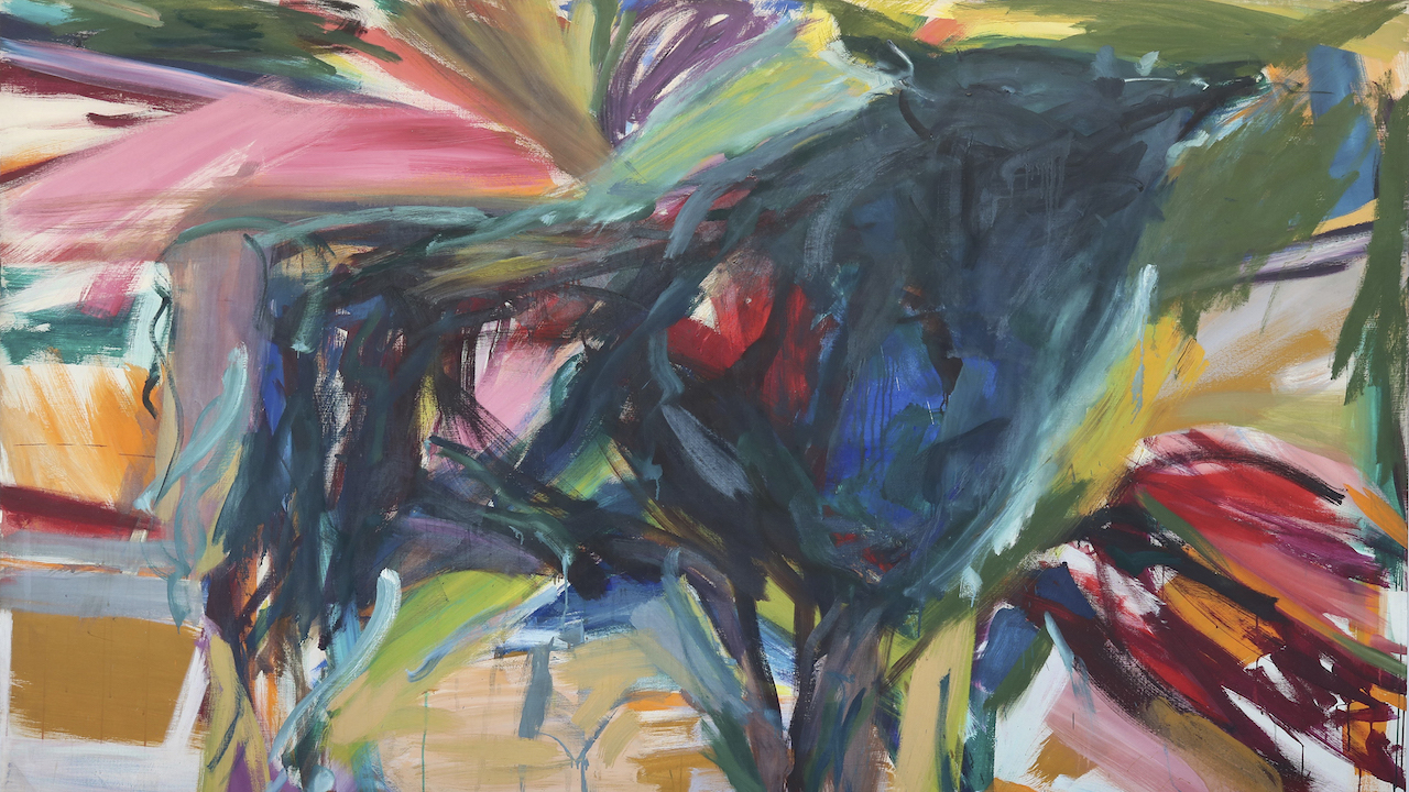 Brush strokes of all colors—from tan to pink to lime green—fill a canvas. This is an up-close shot of the work.