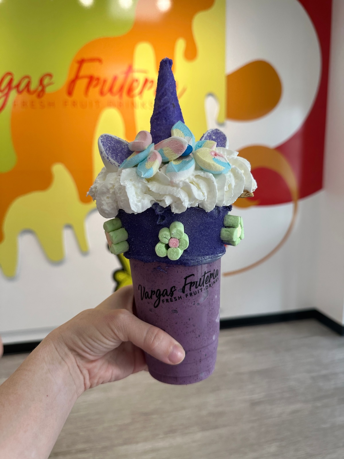 person holding a milkshake