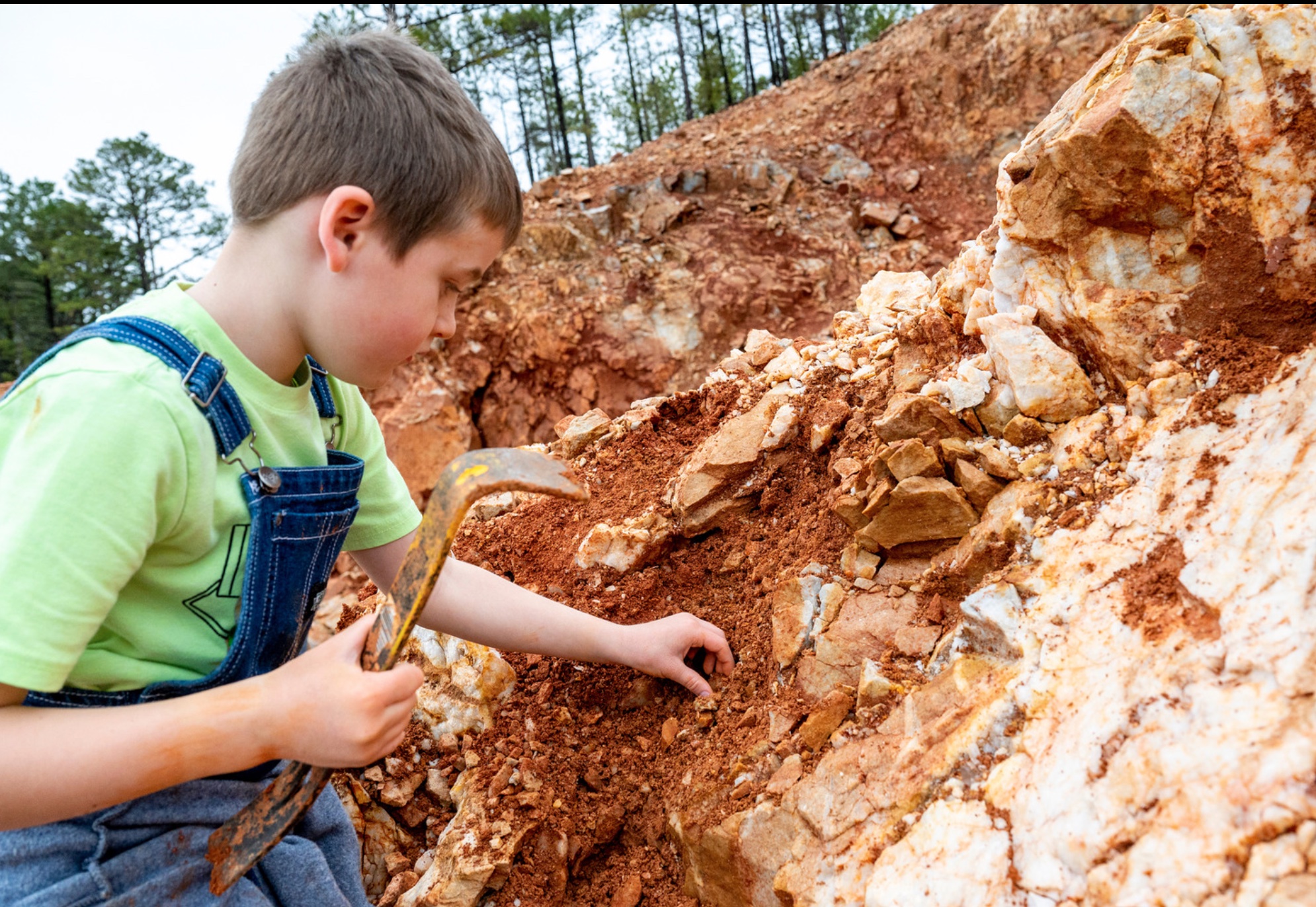 Digging for crystals in Mount Ida 