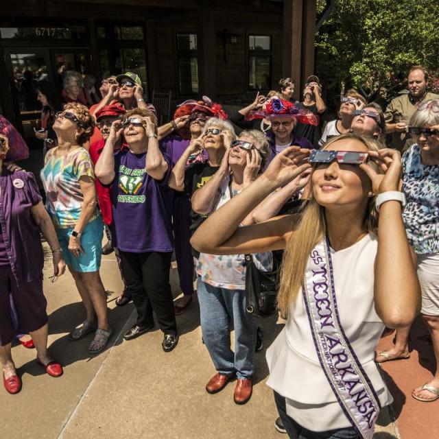 Crowd watching the 2017 Total Solar Eclipse with eclipse glasses