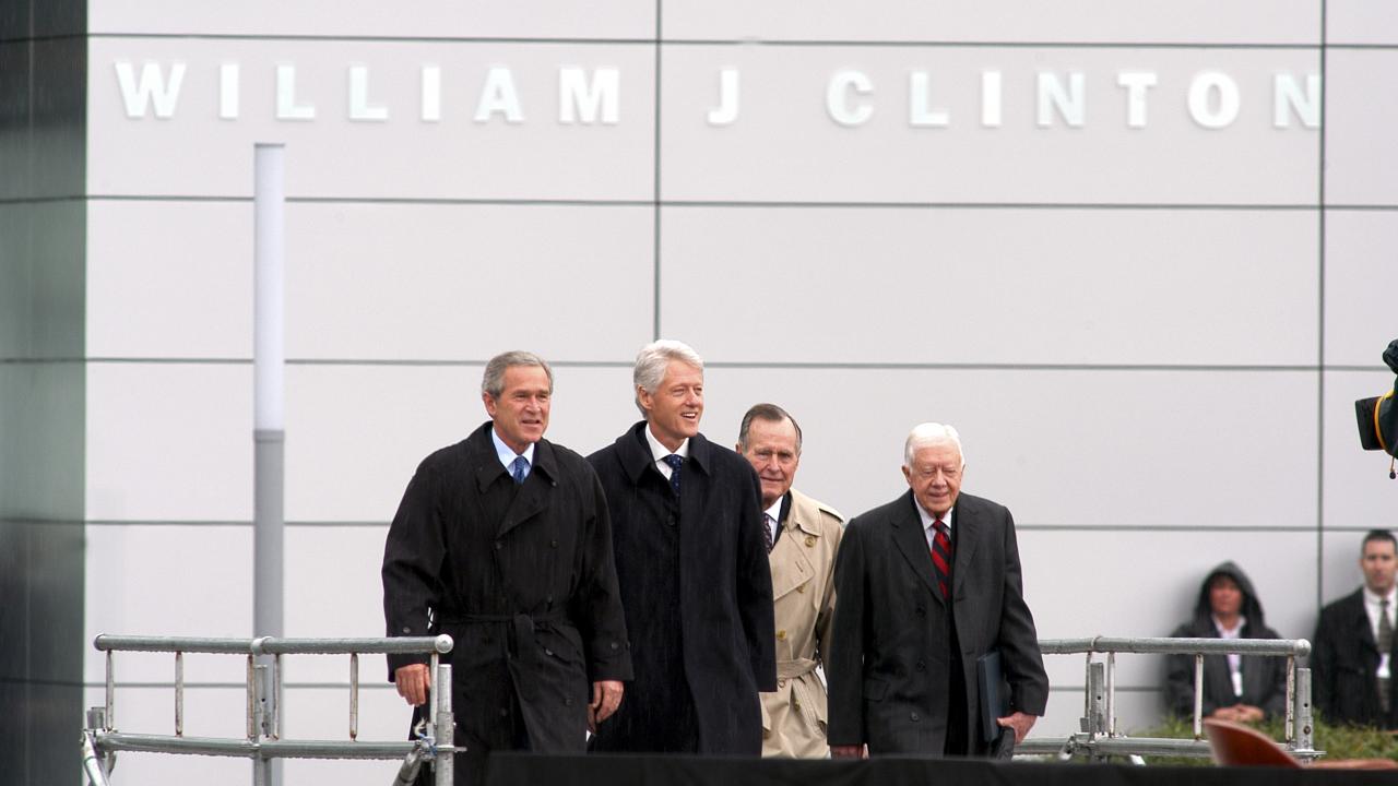 George W. Bush, Bill Clinton, George H.W. Bush, and Jimmy Carter attend the Clinton Library Dedication