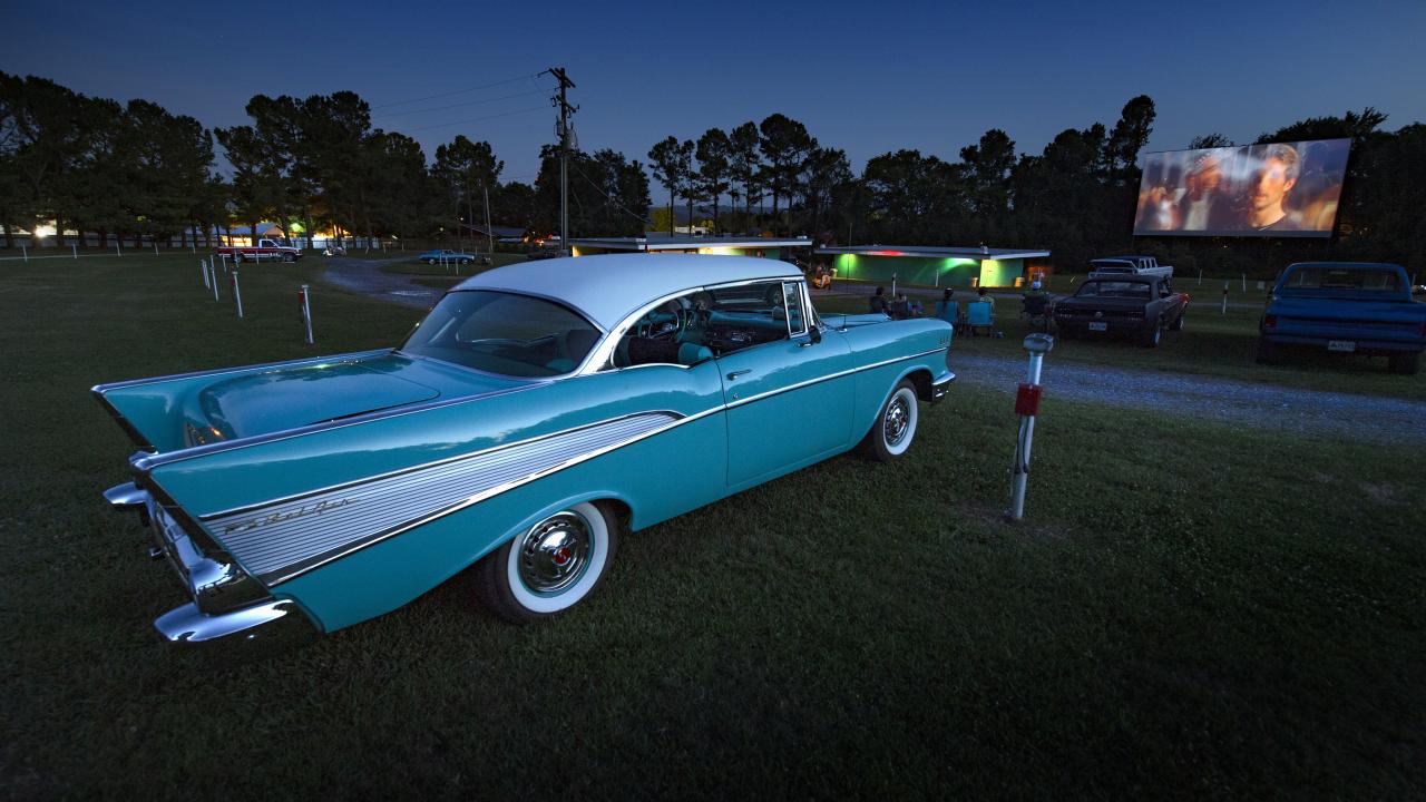 Antique cars take in a movie at the Kenda Drive Inn in Marshall
