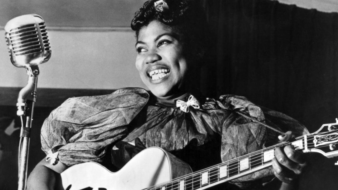 Sister Rosetta Tharpe singing and playing guitar