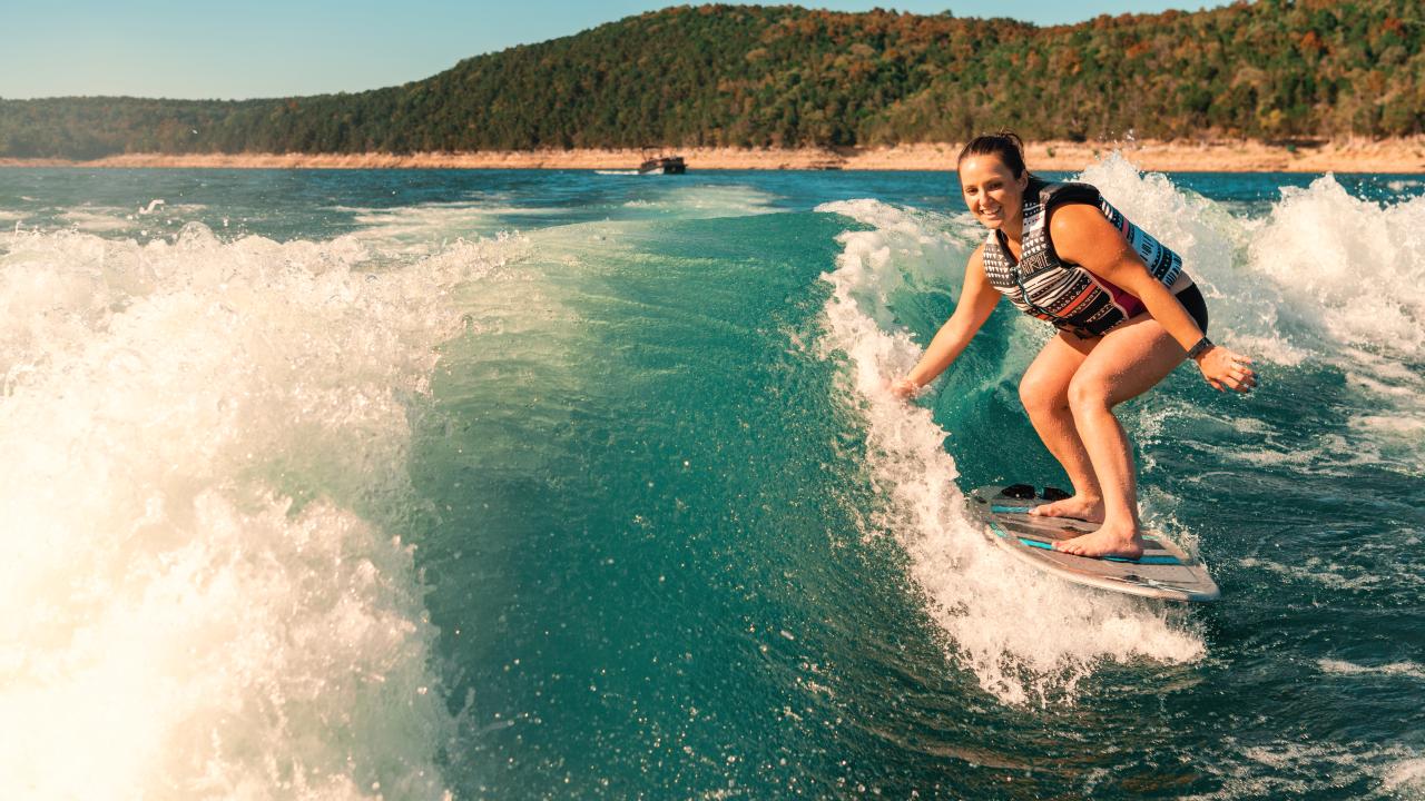 Wake surfing on a lake near Mountain Home