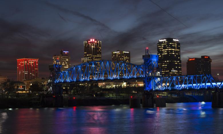 A picture of the Junction Bridge at night in downtown Little Rock. 
