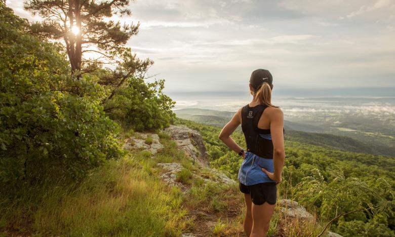 Female hiker taking in the views at Mount Magazine