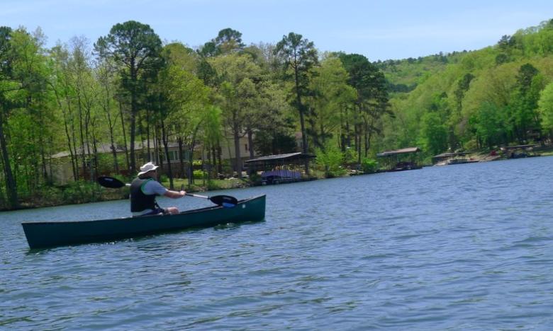 Charlie Brown paddling on Lake DeSoto.