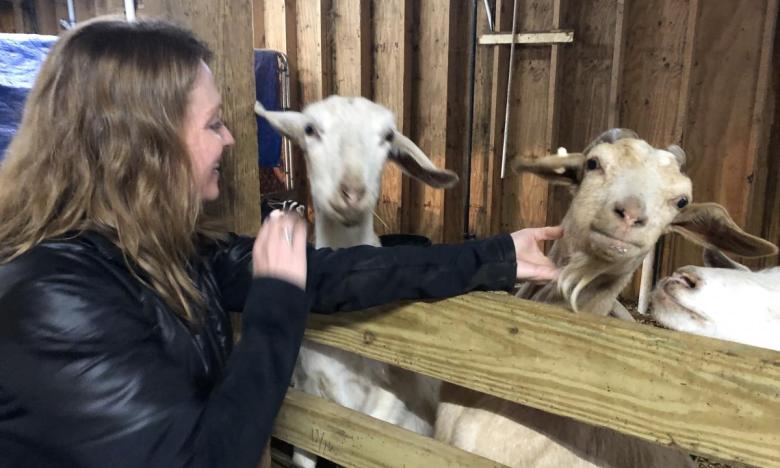 Jill petting the goats
