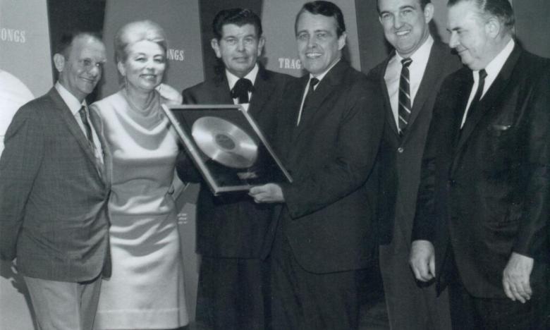 Elton Britt holding his Gold Record