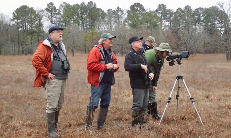 Connecticut Audubon members looking for birds at the Warren Prairie Natural Area