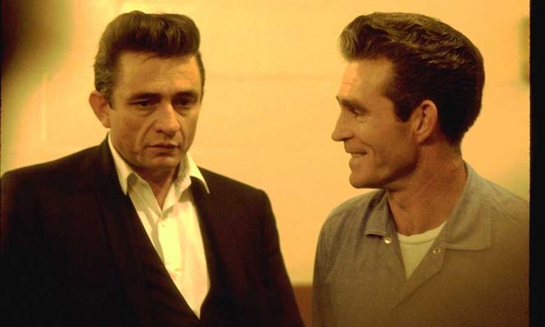 Cash with Glen Sherley, a prisoner at Folsom who wrote the song "Greystone Chapel," which Cash performed at the concert. After his release, Sherley had a country music career initially backed by Cash. It was unfortunately short-lived - Sherley continued to struggle with drugs and violence and ultimately committed suicide. It's a sad story, but it shows Cash's care for and support of prisoners.