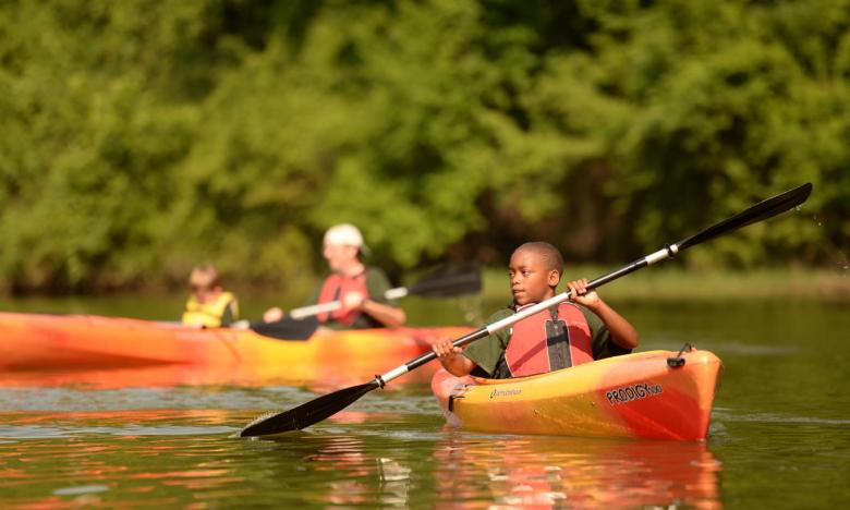 Kayaking during the Governor's Capital Camp at Pinnacle Mountain State Park