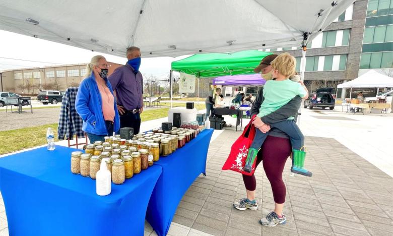 A booth at the Argenta Farmers Market.