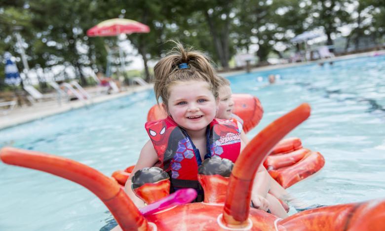 Soak up the sun: Summer fun can be found in one of six swimming pools.