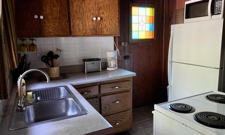The kitchen of a cabin at White Rock Mountain in Arkansas
