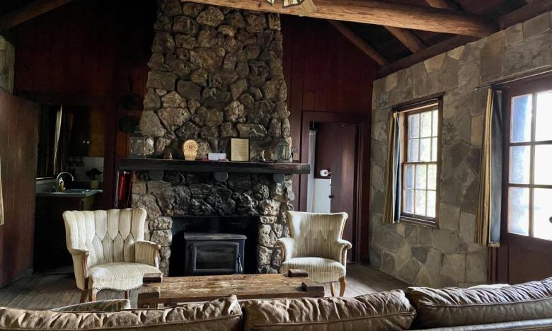 The living room of a cabin at White Rock Mountain in Arkansas