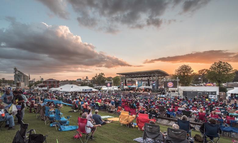 The Mississippi River levee is the main stage for festival magic.
