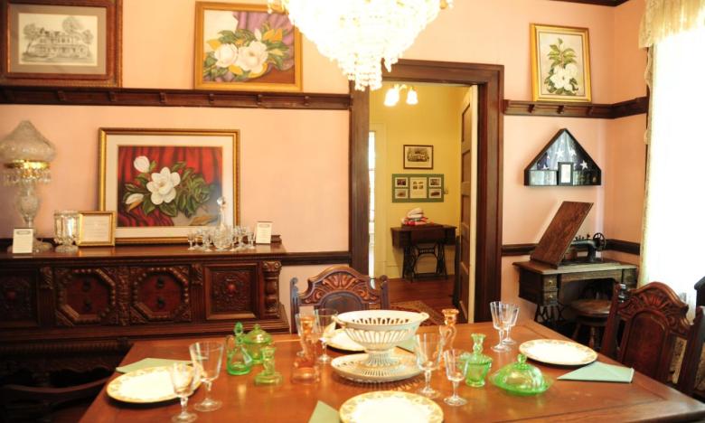 Art by local artists and period furnishings are showcased in the museum.