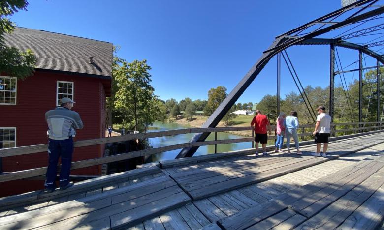 A view of the mill and creek from War Eagle Bridge