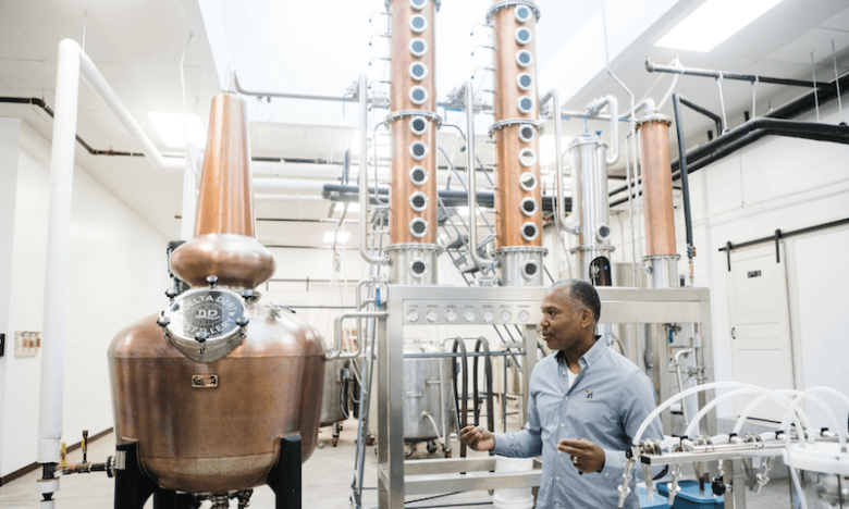 Harvey Williams explaining the distilling process at Delta Dirt.