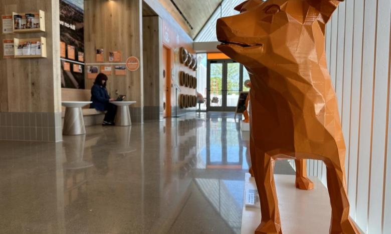 Orange statues are memorials to beloved pets.