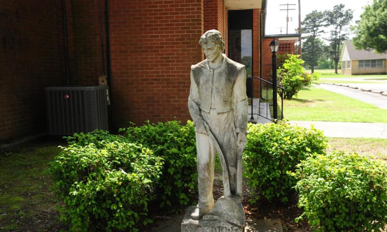 A statue of Saint Isidore, the patron saint of farmers. 