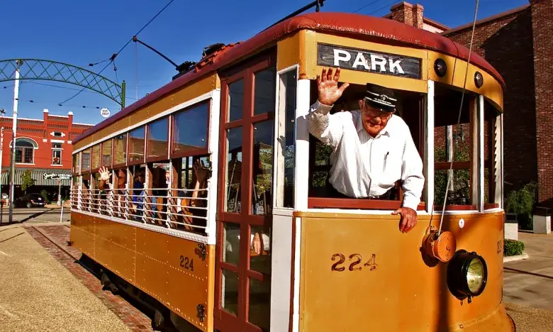 Trolley driver waving