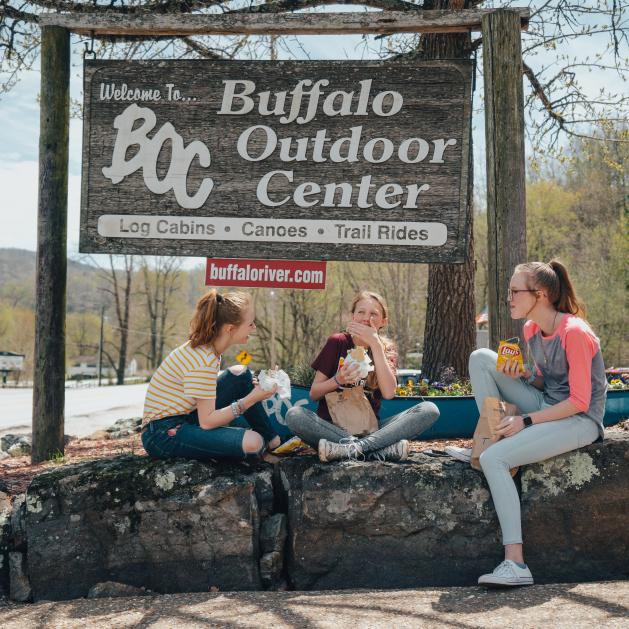Friends eating deli sandwiches from Buffalo Outdoor Center in Arkansas