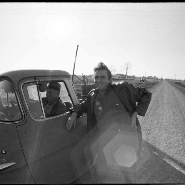 Johnny Cash on the gravel road leading to his boyhood home in Dyess in 1969.