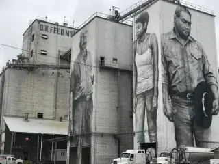 American Heroes mural on the OK Foods feed mill in Fort Smith, AR