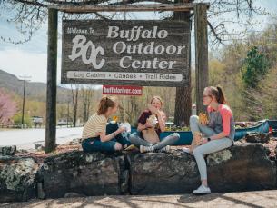 Friends eating deli sandwiches from Buffalo Outdoor Center in Arkansas