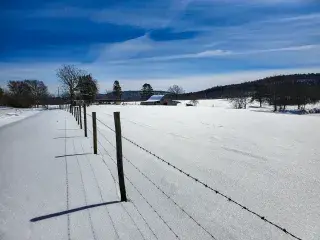 Snow on a Barn along the Highway