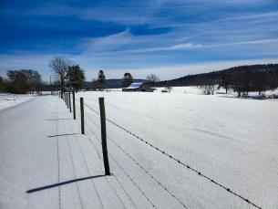 Snow on a Barn along the Highway