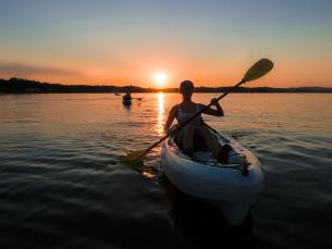 Kayaking at sunset in Balbao Lake in Hot Springs Village