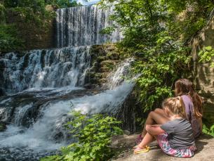 Start your summer getaway at Mirror Lake Falls.