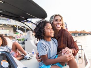 family smiling at lake hamilton
