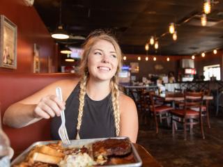 woman eating at a restaurant
