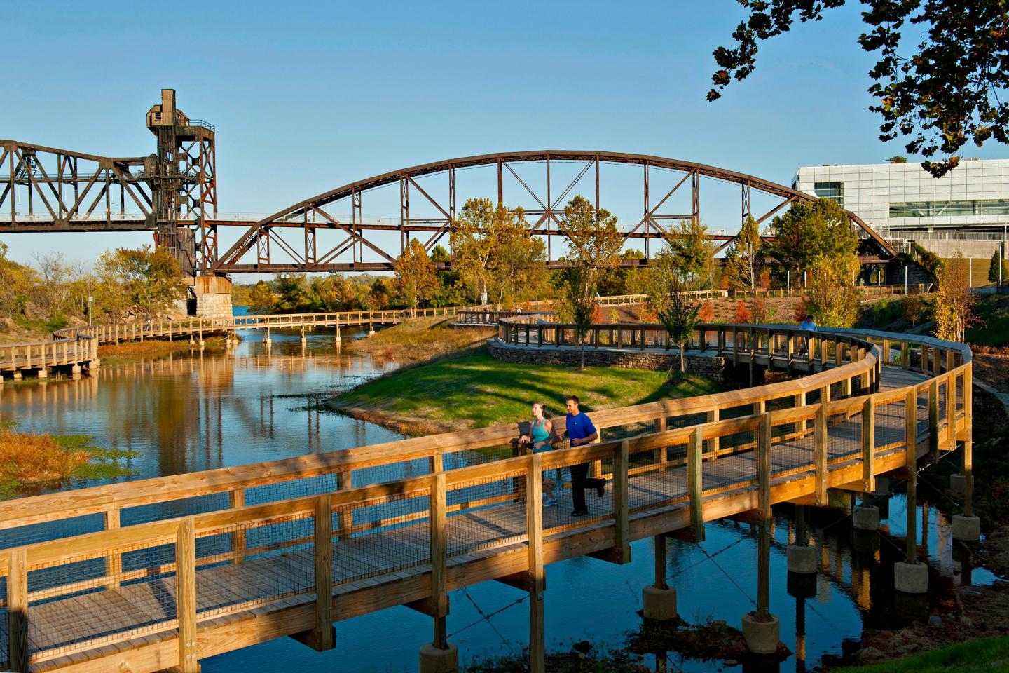 The Bill Clark Presidential Park Wetlands are situated alongside the Arkansas River with views of the Clinton Presidential Center