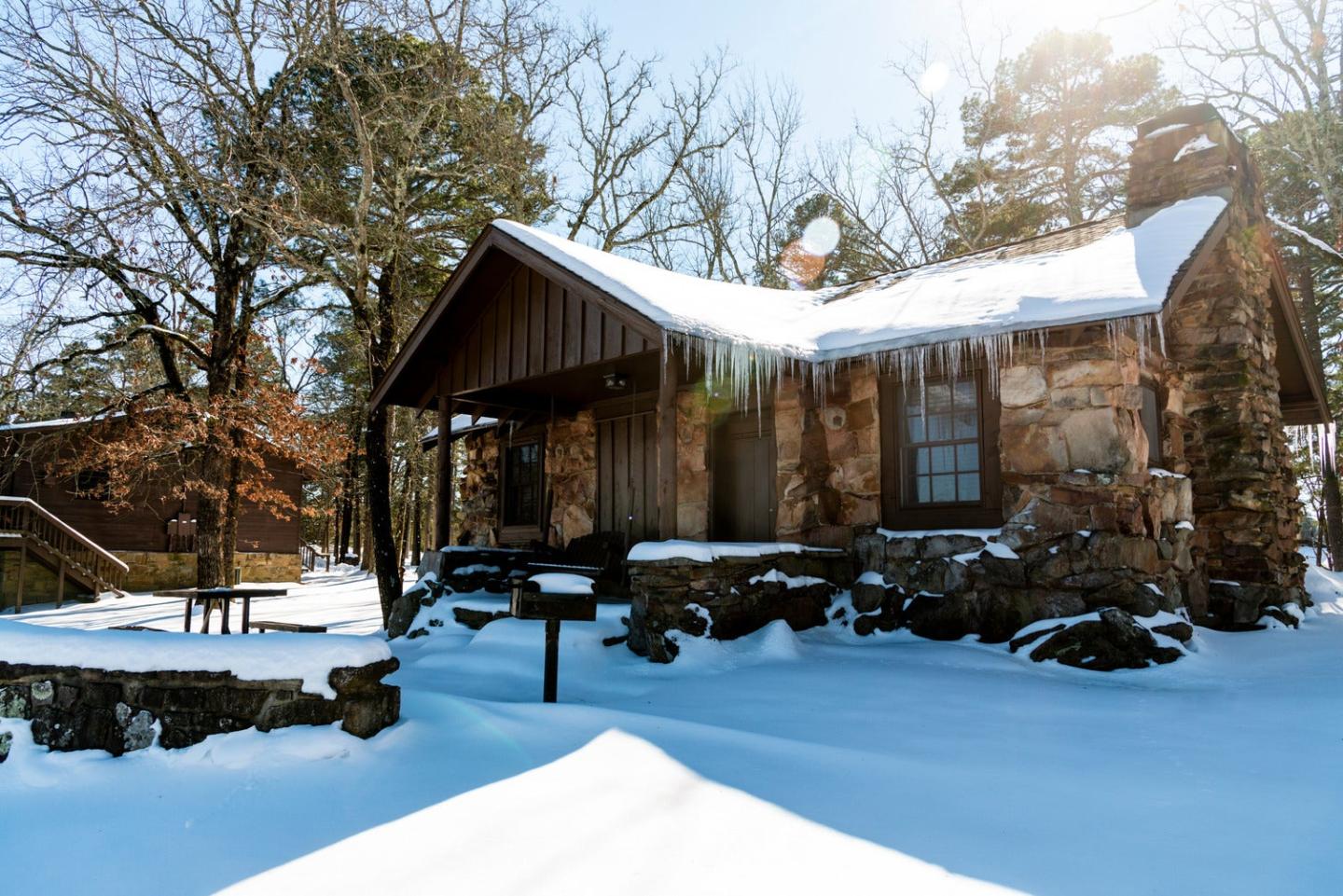 Cabin in the snow at Petit Jean