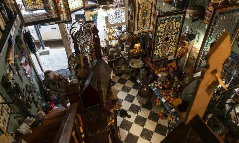 Antique store with checkered floor and stained glass panels.