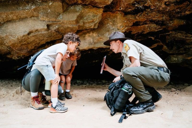Park Ranger and children at Bear Cave Trail