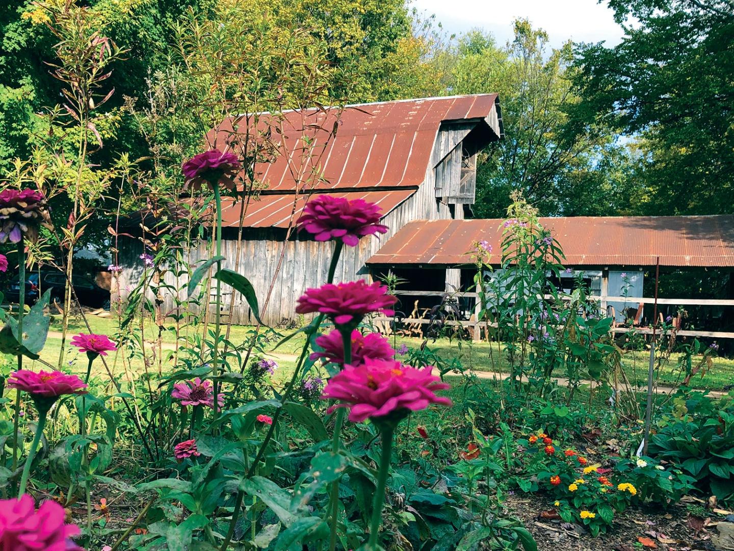 The 1930s Cooper Barn, once located on a small farm north of Springdale, includes a wagon used on the nearby Joyner farm in 1911.