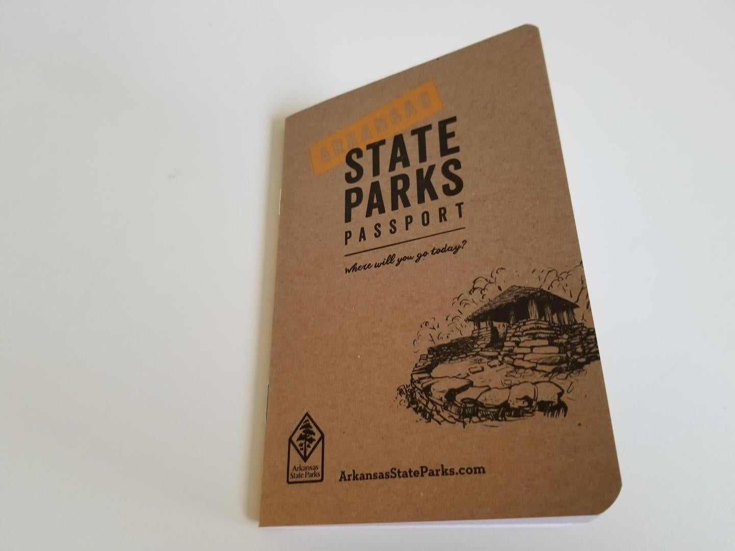 State parks passport with an illustration of a cabin.