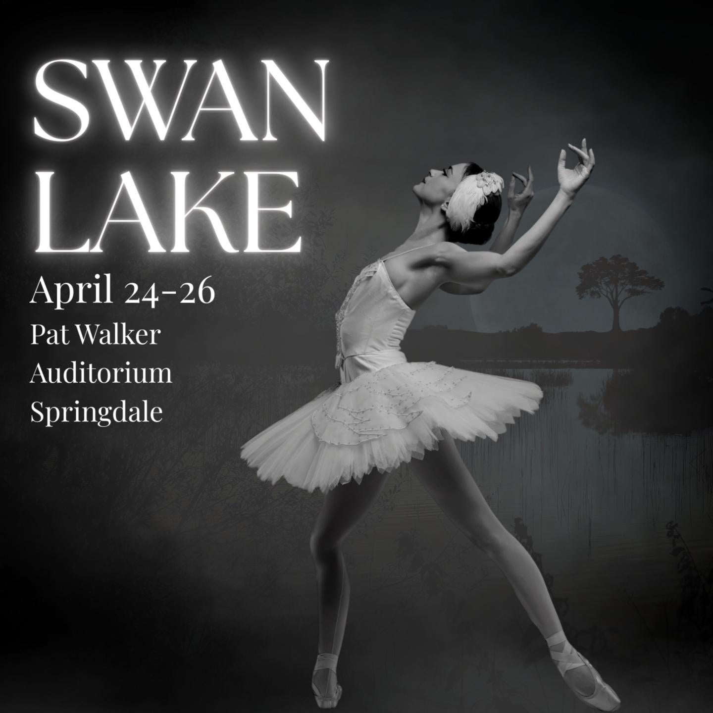 Ballet dancer in white tutu posed gracefully against a dark background.